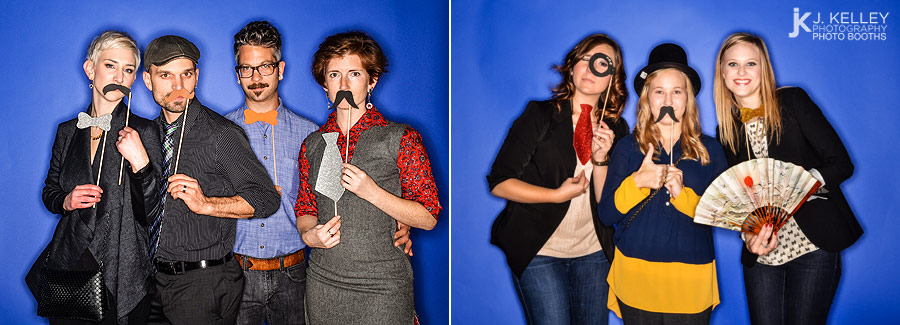 Guests enjoying birthday party with props on a stick and Columbia Missouri Photo Booth Rental
