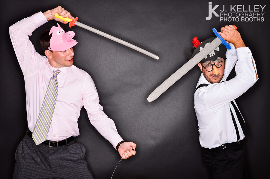 Photo booth props on a black background at a Columbia, Mo wedding reception