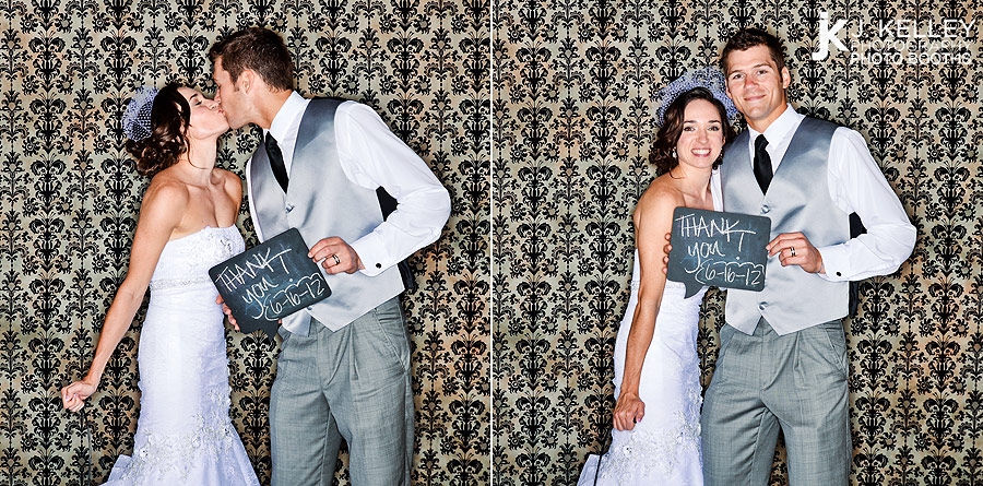 Bride and Groom use a photo booth at their wedding reception in St. Louis, Mo